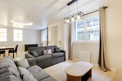 Coin salon dans l'établissement Pick A Flat's Apartment in La Chapelle - Impasse du Curé