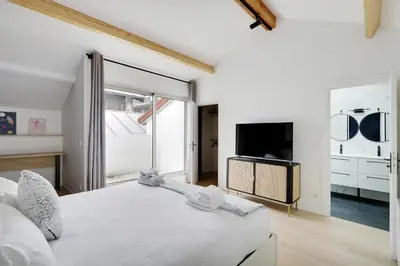Un ou plusieurs lits dans un hébergement de l'établissement Pick A Flat's Apartment in La Chapelle - Impasse du Curé