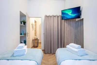 Un ou plusieurs lits dans un hébergement de l'établissement Bohemian Flat - Lovely Marais
