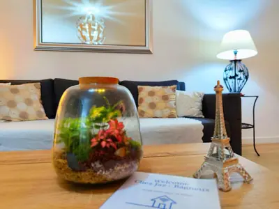 Coin salon dans l'établissement Bright Spacious Apartment near Paris Metro 4