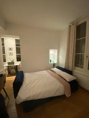 Un ou plusieurs lits dans un hébergement de l'établissement APPARTEMENT PARIS - LOUVRE & RIVOLI