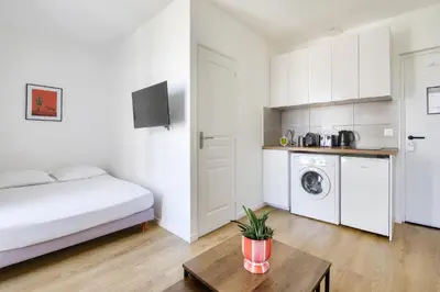 Cuisine ou kitchenette dans l'établissement Résidence Paris Ivry House