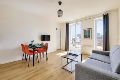 Télévision ou salle de divertissement dans l'établissement Résidence Paris Ivry House
