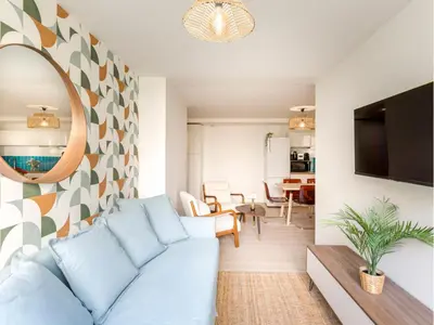 Télévision ou salle de divertissement dans l'établissement Merveil - Family Suite - Tour Eiffel - Viala II