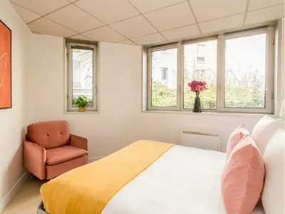 Un ou plusieurs lits dans un hébergement de l'établissement Merveil - Family Suite - Tour Eiffel - Viala I