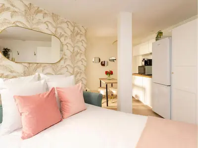 Un ou plusieurs lits dans un hébergement de l'établissement Merveil - Family Suite - Tour Eiffel - Viala I
