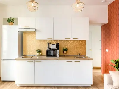 Cuisine ou kitchenette dans l'établissement Merveil - Family Suite - Opera - Caumartin I