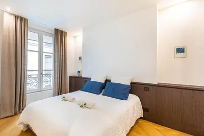 Un ou plusieurs lits dans un hébergement de l'établissement GuestReady - Appt moderne dans le 7e
