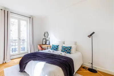 Un ou plusieurs lits dans un hébergement de l'établissement GuestReady - Appt moderne dans le 7e