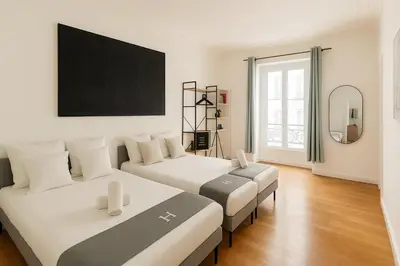 Un ou plusieurs lits dans un hébergement de l'établissement SLEEPOO - Paradise 8