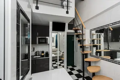 Cuisine ou kitchenette dans l'établissement Charmant studio près des Champs-Élysées