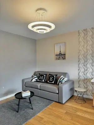 Coin salon dans l'établissement Appartement Avec Balcon Vue Sur La Défense