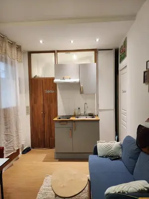 Cuisine ou kitchenette dans l'établissement Home Cosy ARENA Porte de la Chapelle