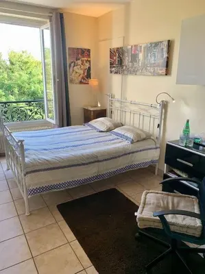 Un ou plusieurs lits dans un hébergement de l'établissement PARIS centre 30m2- cuisine-Métro Glacière