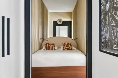 Un ou plusieurs lits dans un hébergement de l'établissement Interior Design - Apartment 6P-2BR - Tour Eiffel