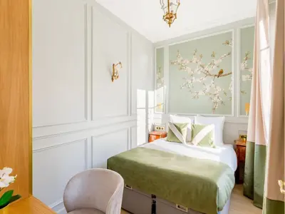Un ou plusieurs lits dans un hébergement de l'établissement Merveil - Luxury Suite - Louvre - Opera II