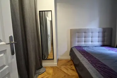 Un ou plusieurs lits dans un hébergement de l'établissement Apartment near Montmartre