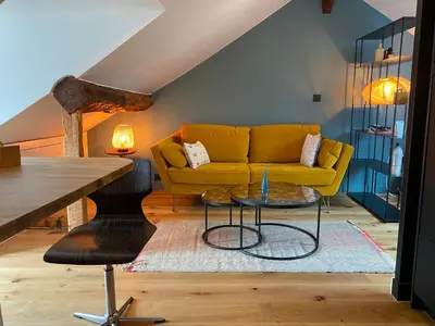 Coin salon dans l'établissement Le Loft Lepic