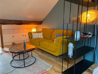 Coin salon dans l'établissement Le Loft Lepic