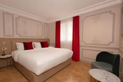 Un ou plusieurs lits dans un hébergement de l'établissement Mode Paris Aparthotel