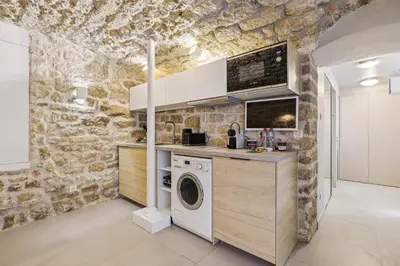 Cuisine ou kitchenette dans l'établissement Lavie Maison face Palais Royal