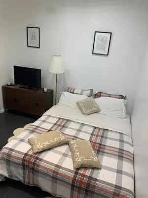 Un ou plusieurs lits dans un hébergement de l'établissement Charmant appartement - PARIS 18