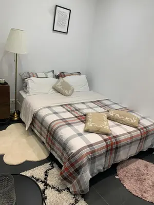 Un ou plusieurs lits dans un hébergement de l'établissement Charmant appartement - PARIS 18