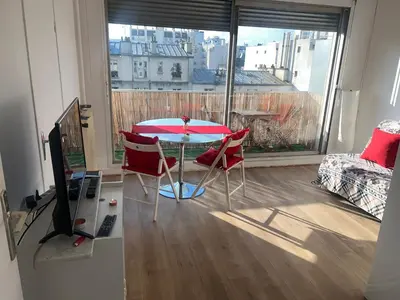 Télévision ou salle de divertissement dans l'établissement Cómodo Apartamento