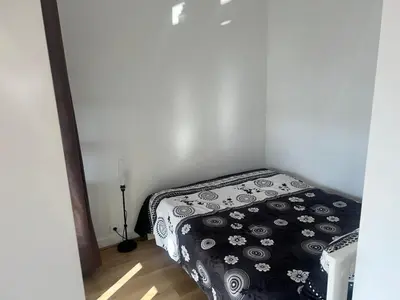 Un ou plusieurs lits dans un hébergement de l'établissement Cómodo Apartamento