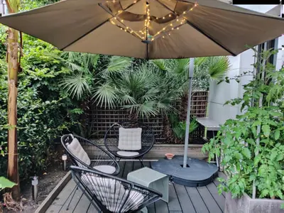 Jardin de l'établissement Terrasse Zen - Confort Nature & Accessibilité - 4 personnes - Parking gratuit - 20 min de Paris