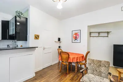 Télévision ou salle de divertissement dans l'établissement Charmant 34 m au cœur de Montmartre