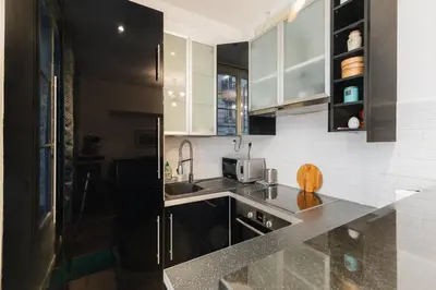 Cuisine ou kitchenette dans l'établissement Charmant 34 m au cœur de Montmartre