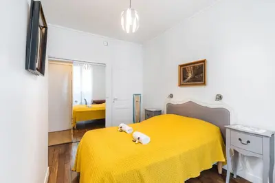 Un ou plusieurs lits dans un hébergement de l'établissement Charmant 34 m au cœur de Montmartre