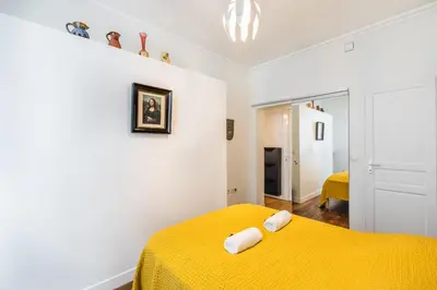 Un ou plusieurs lits dans un hébergement de l'établissement Charmant 34 m au cœur de Montmartre