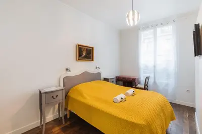 Un ou plusieurs lits dans un hébergement de l'établissement Charmant 34 m au cœur de Montmartre
