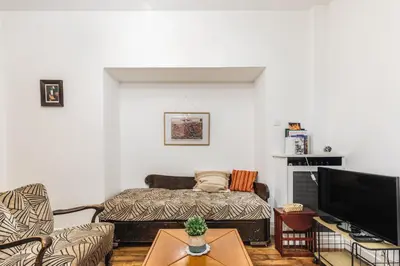 Télévision ou salle de divertissement dans l'établissement Charmant 34 m au cœur de Montmartre