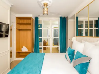 Un ou plusieurs lits dans un hébergement de l'établissement Merveil - Luxury Suite - Marais - Saint Martin I