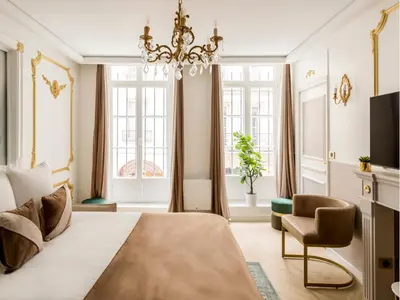 Un ou plusieurs lits dans un hébergement de l'établissement Merveil - Luxury Suite - Marais - Saint Martin I