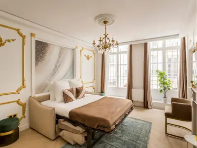 Un ou plusieurs lits dans un hébergement de l'établissement Merveil - Luxury Suite - Marais - Saint Martin I