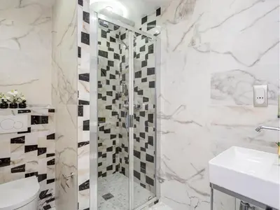 Salle de bains dans l'établissement Merveil - Luxury Suite - Marais - Saint Martin I