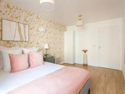 Un ou plusieurs lits dans un hébergement de l'établissement Merveil Family Suite - Champs Elysees - Roosevelt