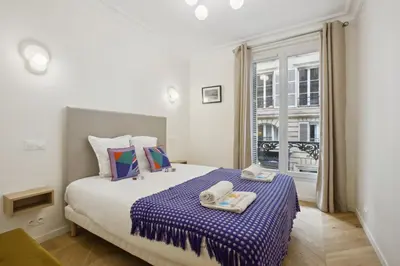 Un ou plusieurs lits dans un hébergement de l'établissement 268 Suite Ville - Superb apartment in Paris