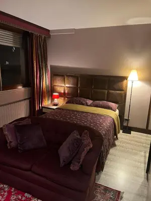 Un ou plusieurs lits dans un hébergement de l'établissement Studio dans le quartier luxe
