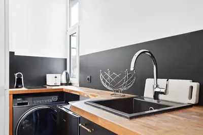 Cuisine ou kitchenette dans l'établissement 249 Suite Arcade - Superbe Appartement à Paris