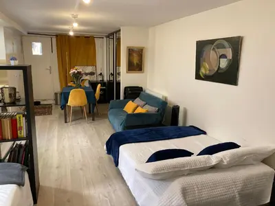 Coin salon dans l'établissement Une chambre chez nous, à 12 minutes de Paris