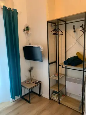 Un ou plusieurs lits dans un hébergement de l'établissement Paris studio cosy climatisé