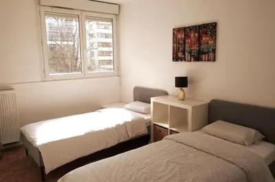 Un ou plusieurs lits dans un hébergement de l'établissement Cosy 2 BR, La Défense, 5 min walk metro+parking