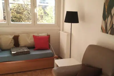 Coin salon dans l'établissement Cosy 2 BR, La Défense, 5 min walk metro+parking