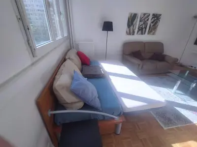 Coin salon dans l'établissement Cosy 2 BR, La Défense, 5 min walk metro+parking