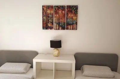 Coin salon dans l'établissement Cosy 2 BR, La Défense, 5 min walk metro+parking